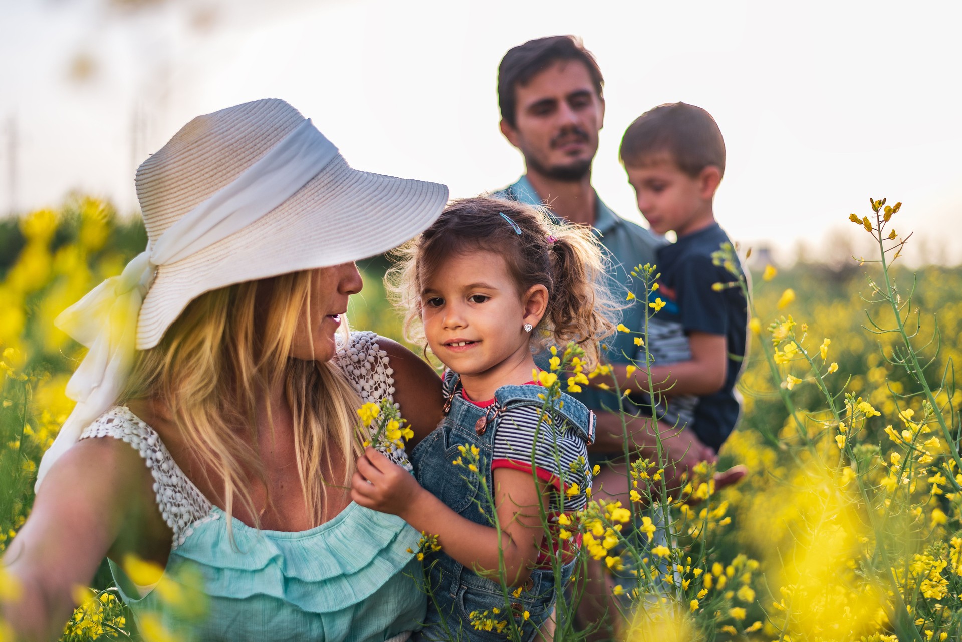 Young happy family enjoying nature